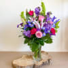 Theme Colors: Shades of purples and pinks

Featured Blooms: Stargazer Lilies, Bells of