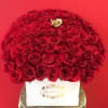 RED ROSES IN WHITE BOX WITH ONE GOLD ROSE 