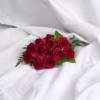Roses wrapped in a bouquet sleeve with a ribbon.