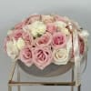This beautiful arrangement of pink roses is the perfect way to add