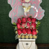 8 roses with baby breath and 4 chocolates

&quot;Picture is a reference every