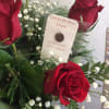 Beautiful Red Roses w/ "Hole in my Heart" Charm included. Thoughtful gift