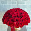 Hold vase filled with beautiful red roses. 

You can choose your flower
