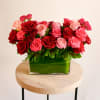 This romantic arrangement features a beautiful collection of our premium red and