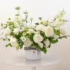A stunning white bouquet that evokes simplicity, calmness, and peace. This arrangement