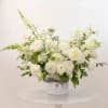 Beautiful and simply elegant arrangement of all white (mostly local!) blooms. 