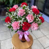 Evoke romance with &#039;Sweetheart Carnation Bouquet,&#039; a stunning floral arrangement featuring red