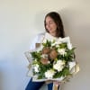 A heartwarming blend of flowers and cuddles!
Our Teddy Bloom Bouquet is a