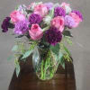 Combining the playful charm of carnations with the classic beaurty of roses.