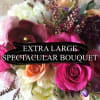 Let our designers create a spectacular display of lush blooms in a