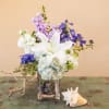 A beautiful and fragrant combination of white oriental lilies, white and lavender