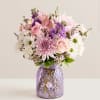 NEW Inspired by the beauty of a blooming backyard garden, our bouquet