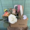 Flower arrangement and a candle set is a perfect gift for any