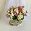 Theme Colors: Shades of pinks, purples and whites

Featured Blooms: Roses, Tulips, Spray