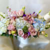 Theme Colors: Shades of white, blue, pink and green 

Featured Blooms: Roses