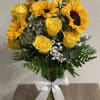 Make someone smile with this delightful bouquet of sunflowers, yellow roses, baby&rsquo;s