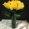  Long Stemmed Roses tightly arranged in a Cylinder vase..
Arrangement can be