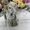 A soft, beautiful mix of fresh hydrangea, roses, spray roses and more