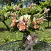 Stargazer lillies, hydrangeas, roses, spray roses, snap dragons, alstroemeria lilies. 