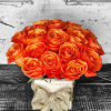 Introducing the enchanting &#039;Orange Blossom&#039; design &ndash; bright orange roses elegantly arranged
