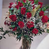 Red roses, oriental lilies in vase