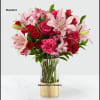Treat your better half to an arrangement filled with blushing blooms and