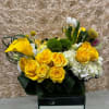 Gorgeous arrangement to brighten up anyone&#039;s day with yellow and white flowers.