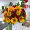 Red roses and sunflowers in our &quot;rozellas&quot; box, box color may vary