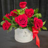 The pictures do not do this arrangement justice! Pristine White Rose Soiree