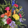 A basket mix of a green house plant and fresh flowers. Can&#039;t
