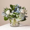 Let this uplifting arrangement be reminders of the clear skies ahead. Capturing
