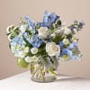 Let this uplifting arrangement be reminders of the clear skies ahead. Capturing