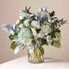 Let this uplifting arrangement be reminders of the clear skies ahead. Capturing