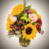 Brighten any space with our Sunlit Garden Bloom Bouquet, a radiant mix