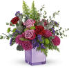 A serene style statement in lush lavender roses and fresh maroon blooms