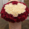 A beautiful white rose heart enclosed in Red roses, Designed in a