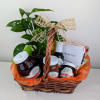Variety of SeaQuist Orchards goods, nestled in a basket adorned with ribbon