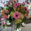 gerbera daisies, hydrangea and spray roses