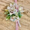Made from fresh flowers, a corsage looks like a petite flower arrangement