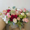 Theme Colors: Shades of white, red and pink

Featured Blooms: Roses, Ranunculus, Orchids