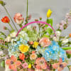 Theme Colors: Shades of peach and yellow in a basket 

Featured Blooms: