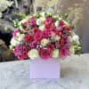 Brighten any space with our Elegant Flower Box Arrangement! Bursting with vibrant