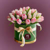 Embrace the essence of spring with our Tulip Bliss floral arrangement! Featuring