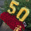 This is a unique arrangement made of fresh roses and accompanied with