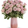 One dozen lush pink roses look absolutely divine in this cherry quartz-inspired