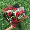 6 premium Red Roses wrapped with baby&rsquo;s breath and foliage. Wrapped with