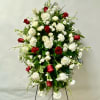 This Standing Spray on an Easel includes White and Red Roses, White