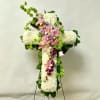 This Cross on an Easel includes White Carnations, Bells of Ireland, Light