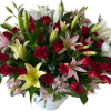 Beautifully arranged with Premium Red Roses with Fragrant Lilies and greenery in
