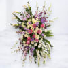 Express your heartfelt condolences with the Lavender Reflections Standing Spray, a serene